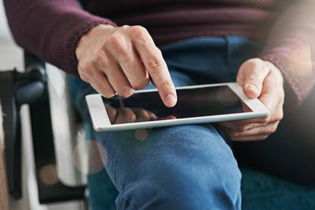Screen, business and hands on person on tablet for networking, connection and internet in office. Startup, closeup and worker on digital tech for online project, research and website for planningの写真素材
