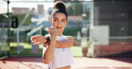 Sports player, woman and stretching arms for practice warm up, tennis competition or getting ready on court. Athlete, space and person with fitness preparation for game performance or workout outdoorの写真素材