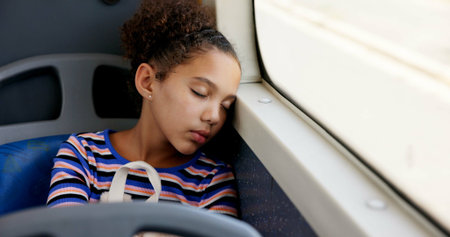 Sleeping, bus and travel with girl, kid and commute with urban journey, resting and calm. Public...
