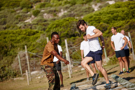 Bootcamp, exercise and obstacle course with men at military base for discipline or obedience. Drill,...