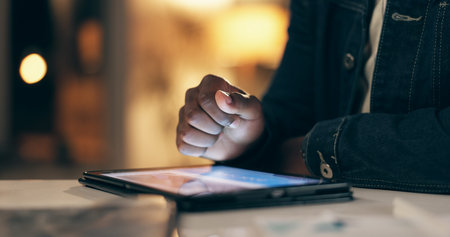 Black man, tablet and working at night in office with browsing on social media for leisure. Online...