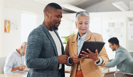 Teamwork, tablet or business people in office meeting for help, support or advice, questions or...