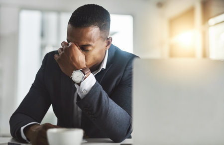 Business, headache and man in office, stress and overworked with deadline. Person, employee and accountant in workplace, migraine and frustrated with anxiety, tax review and burnout with painの写真素材