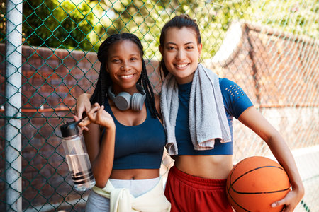 Women, outdoor and towel in portrait for fitness or training on basketball court as athlete. Female...