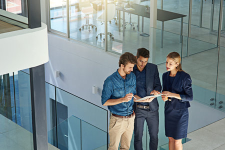 Online, teamwork and people with tablet, business and colleagues with info for market research and...
