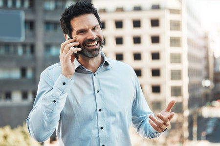 Phone call, portrait and happy with business man in city for communication, networking and contact. Real estate developer, property manager and consultant with person talking for negotiationの写真素材