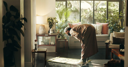 Muslim, man and bow in prayer with faith at house of spiritual worship, praise Allah and Ramadan...