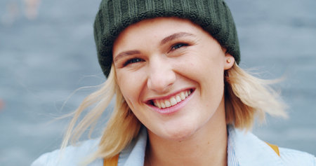 Fashion, student and portrait of woman in city for travel, adventure and explore town on weekend. Happy, casual style and face of person on holiday break for learning, education and college outdoorsの写真素材