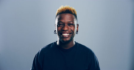 Edgy, happy student or portrait of black man in studio for skill development, college education or...