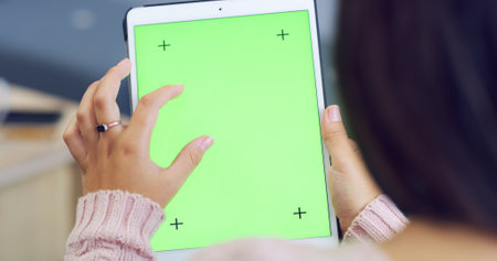 Green screen, tablet and hands of person online for website, internet search and networking. Mockup space, social media and digital tech with tracking markers for user interface, ux and advertisingの写真素材