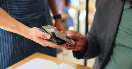 Card, payment and hands of people in cafe with sales, hospitality service and easy credit. Banking, waiter and customer in coffee shop with POS machine for cashless transaction at small businessの写真素材
