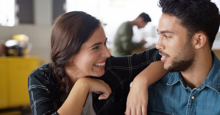 Couple, happy and talking on date in cafe for relationship support, weekend break or affection. Love, people and smile in coffee shop with relax, conversation and bonding together with care and trustの写真素材
