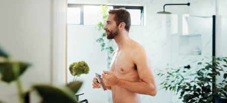 Home, razor and man in bathroom, shaving and shirtless with facial grooming routine, morning and...