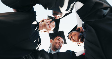Graduation, huddle and success with student friends, outdoor for celebration or education event....