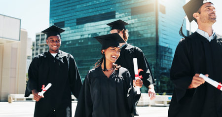 City, graduation and smile with group of students outdoor for celebration or education event. Certificate, future and scholarship with happy friends in urban town for college or university milestoneの写真素材