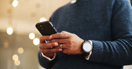 Person, hands and typing with phone for communication, social media or online chatting at hotel....