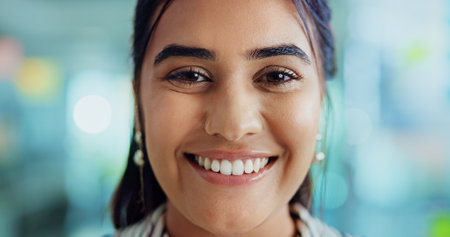 Creative, professional and portrait of business woman with dental smile for journalism career. Healthy teeth, media office and face closeup of person with pride, confidence and happy for writer jobの写真素材
