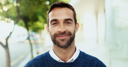 Smile, business and man for portrait in city of career ambition, accountant job and morning commute. Male person, confident and accounting experience, urban travel and about us of finance opportunityの写真素材