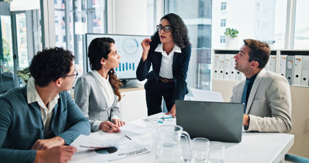 Office, business people and project manager with documents for feedback, meeting and finance update. Team, accountants and financial advisor with paperwork for risk management, discussion and explainの写真素材