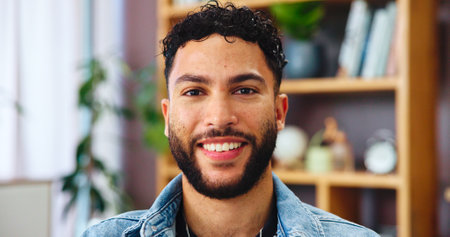 Portrait, relax or happy man in house living room for wellness, weekend or break. Face, sofa or proud male person with confidence, or good mood for satisfaction or resting in home in Portugalの写真素材