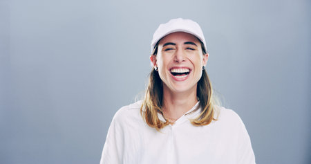 Laugh, student and portrait of girl in studio for humor for sports scholarship, athlete bursary or...