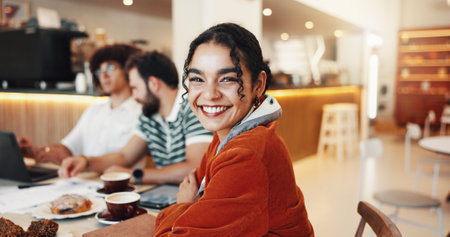 Portrait, smile and woman with colleagues, cafe and confident for collaboration in store, tea and group. Happy, people and journalist with coworkers in meeting, beverage and customer in coffee shopの写真素材