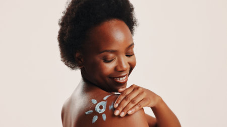 Sunscreen, skincare and shoulder with black woman in studio for beauty, uv protection and cosmetics....