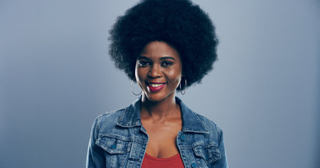 Space, confident and portrait of black woman with creative career for freelance job at magazine. Happy, pride and face of African female copywriter with professional publishing by gray background.の写真素材