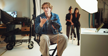 Camera, photography and talking with director man in studio for discussion, photoshoot or planning....