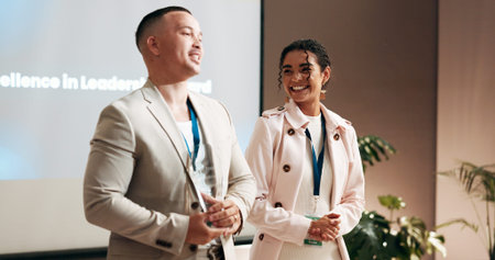 Business, people and speaker with award at conference for corporate excellence, recognition and achievement. Global summit, employees and happy with trophy at event for sales performance and successの写真素材