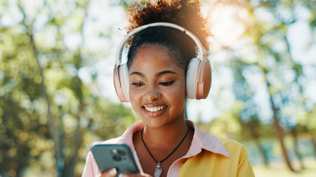 Park, woman and smile with mobile for music, audio track and check location on vacation outdoor....