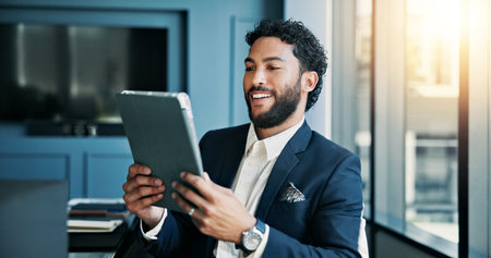 Review, employee and man with tablet, business and checking stock market on web, online and digital. Office, sales manager and person with tech for industry trends, reading and performance of companyの写真素材