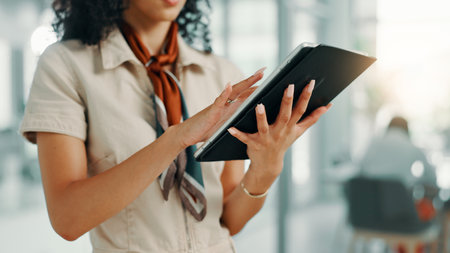 Hands, tablet and research in office, online or monitoring social media performance, digital or browsing. Business, marketing manager and person with tech for website, scroll or planning for campaignの写真素材