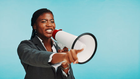 Business, black woman and voice on megaphone in studio for announcement, office broadcast and...