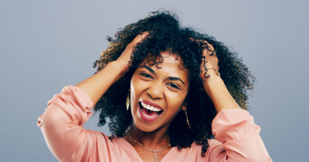Laughing, hair and portrait of African woman in studio for comic, funny and self care with mockup...
