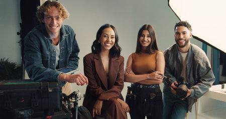 Photography, portrait and smile with people backstage together for filing, photoshoot or production. Collaboration, creative or media with happy makeup artist, model and photographer in studioの写真素材