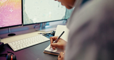 Hands, computer and man writing with map for news, research or ecology in office. Monitor, notebook...