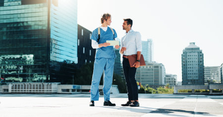 Discussion, city and professor with medical student for support, advice or tips for exam....