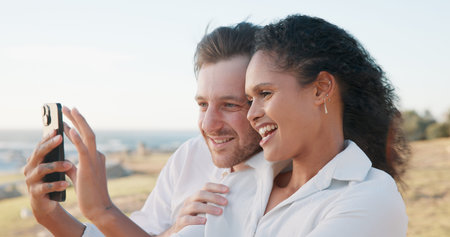 Outdoor, picture and couple with smile, selfie and travel with vacation, romance and marriage....