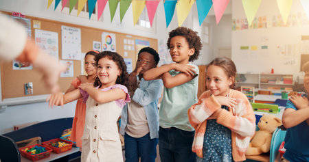 Education, dance and group of kids in classroom together for coordination or motor skills development. Children, learning or study with boy and girl students in school for scholarship as friendsの写真素材