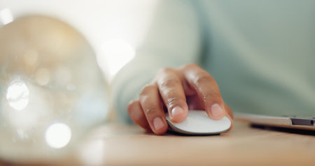 Hands, mouse and person with tech, home and closeup of freelancer for video editing, creative and online. House, entrepreneur and editor with laptop for project, content creation and process for clipの写真素材