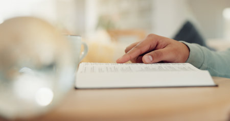 Religion, hands and reading bible in home for spiritual meditation, healing guidance and knowledge of God. Faith, person and holy book for scripture, worship study and christian information for peaceの写真素材