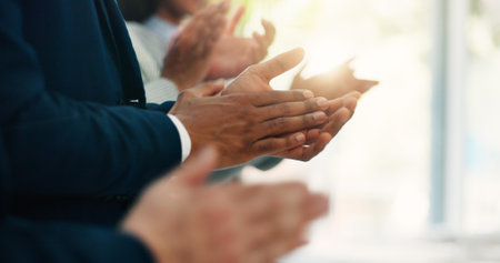 Clapping hands, teamwork and business people in office with goal, achievement or success. Collaboration, celebration and group of financial advisors with applause for target, solidarity or unity.の写真素材
