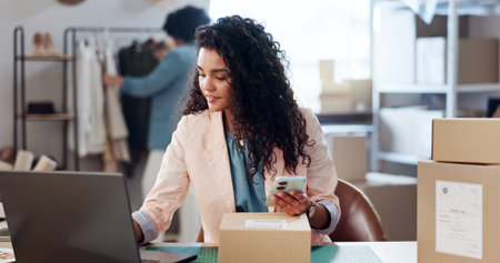 Laptop, phone and woman with cardboard box in office for ecommerce, courier or confirmation....