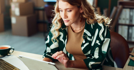 Logistics, schedule and tablet with woman in office for delivery or shipment planning. Agenda, business and supply chain with confident person in depot or warehouse for ecommerce tracking as courierの写真素材