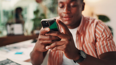 Hands, cellphone and black man in office with contact, communication or social networking with...