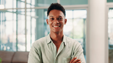 Portrait, business man and happy creative professional in office, brand consultant and worker. Face, smile and confident employee at startup, campaign specialist or pride for career growth in Brazilの写真素材