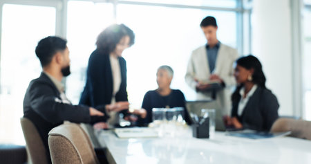 Blur, teamwork and meeting with business people in office for growth strategy, proposal pitch or planning. Sales projection, consultant and budget workshop with employees for brainstorming and profitの写真素材
