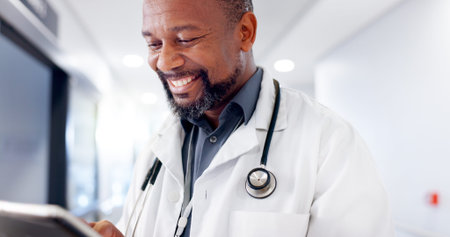 Hospital, doctor and happy black man with tablet for online consulting, medical service and...