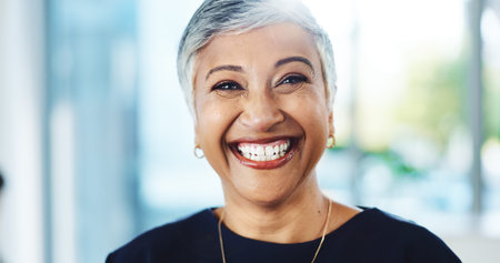Happy, professional and portrait of mature businesswoman in office with confidence for corporate...